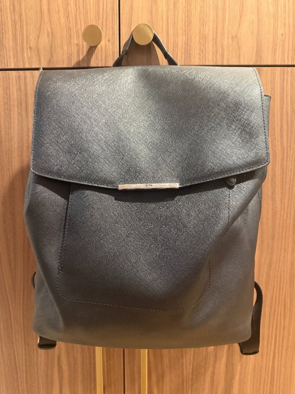 The Tumi Lucca Flap Leather Backpack